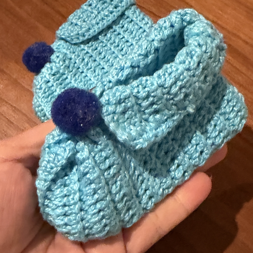 Handmade Baby Booties in Light Turquoise with Navy Pom Poms
